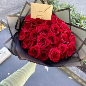 Timeless Rose Wrap with premium red roses in elegant black wrapping by a Santa Monica florist