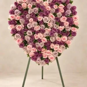 Heartfelt Tribute standing funeral heart with blush, mauve and lavender roses on an easel by a Santa Monica florist